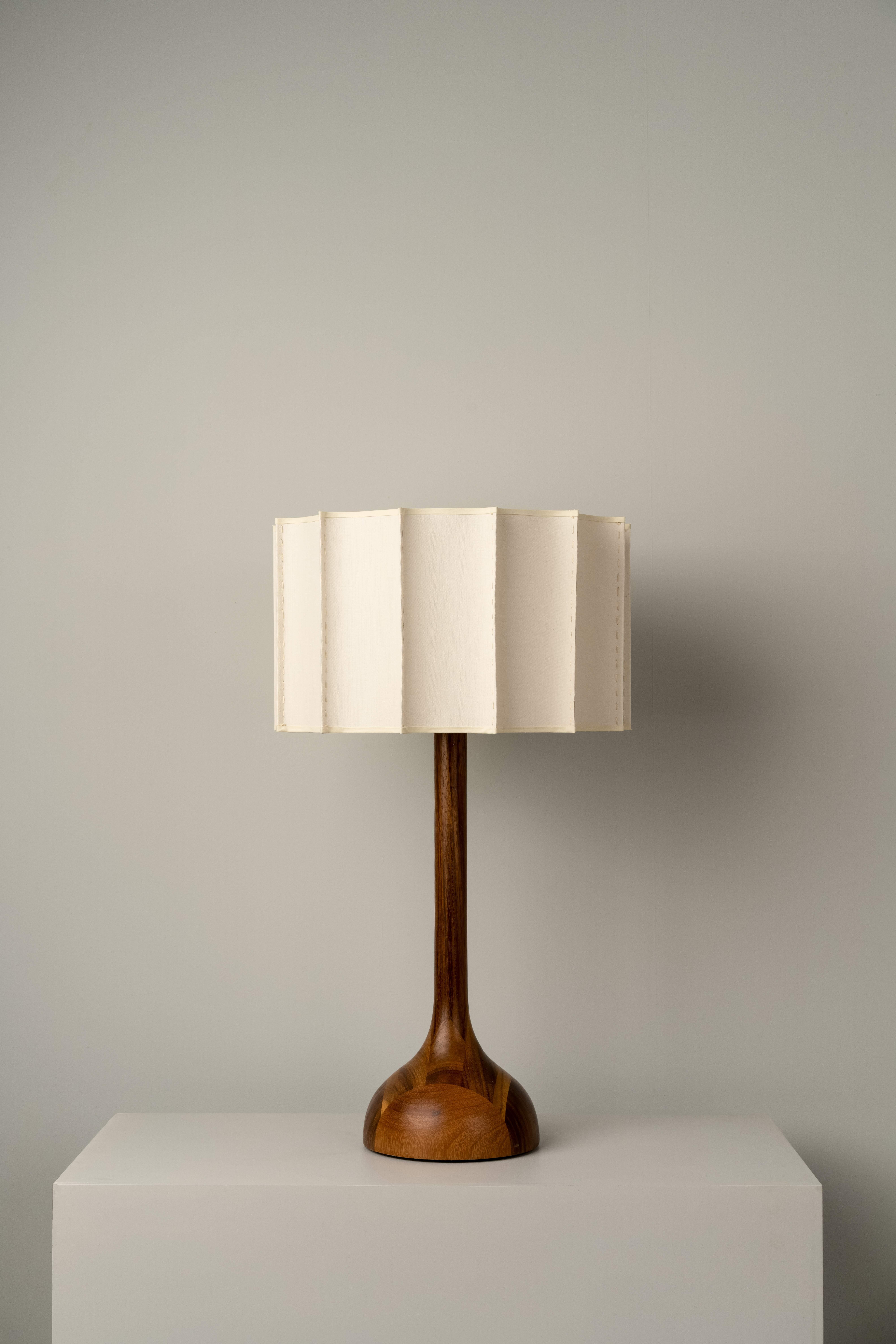 PATA DE ELEFANTE MEDIUM table lamp was designed for the Atomic collection by Mexican artist Isabel Moncada.

Named Pata de Elefante –Elephant's Foot– for the prominent shape at its base. Separated by a long stem is its ornamental, wavy and handmade
