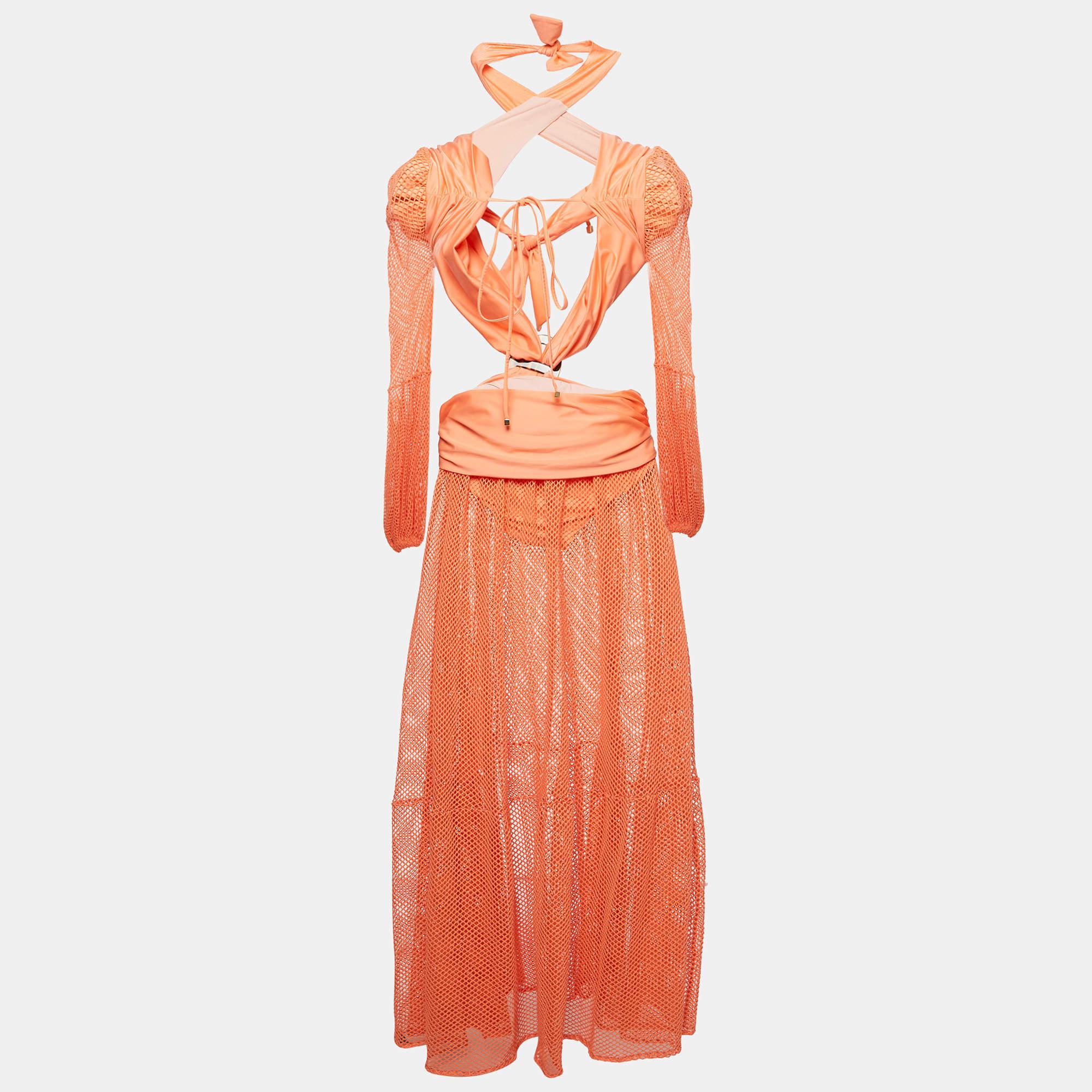 Faites tourner les têtes avec la robe de plage Patbo. Ce modèle à découpes transparentes associe des tons corail éclatants à une silhouette flatteuse.  ce qui le rend parfait pour les journées ensoleillées. La maille complexe ajoute une touche