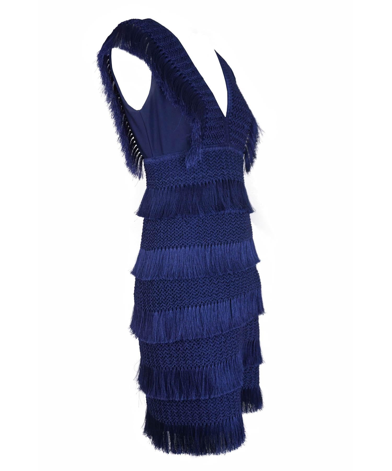 PatBo indigo blue crochet bodycon fringe mini dress. Features v neck, rear concealed zipper, light stretch to fabric. As seen on Jessica Williams on Shrinking. Designer size 6. Made in Brazil.



Condition:

Excellent.
Measurements:

Shoulder: