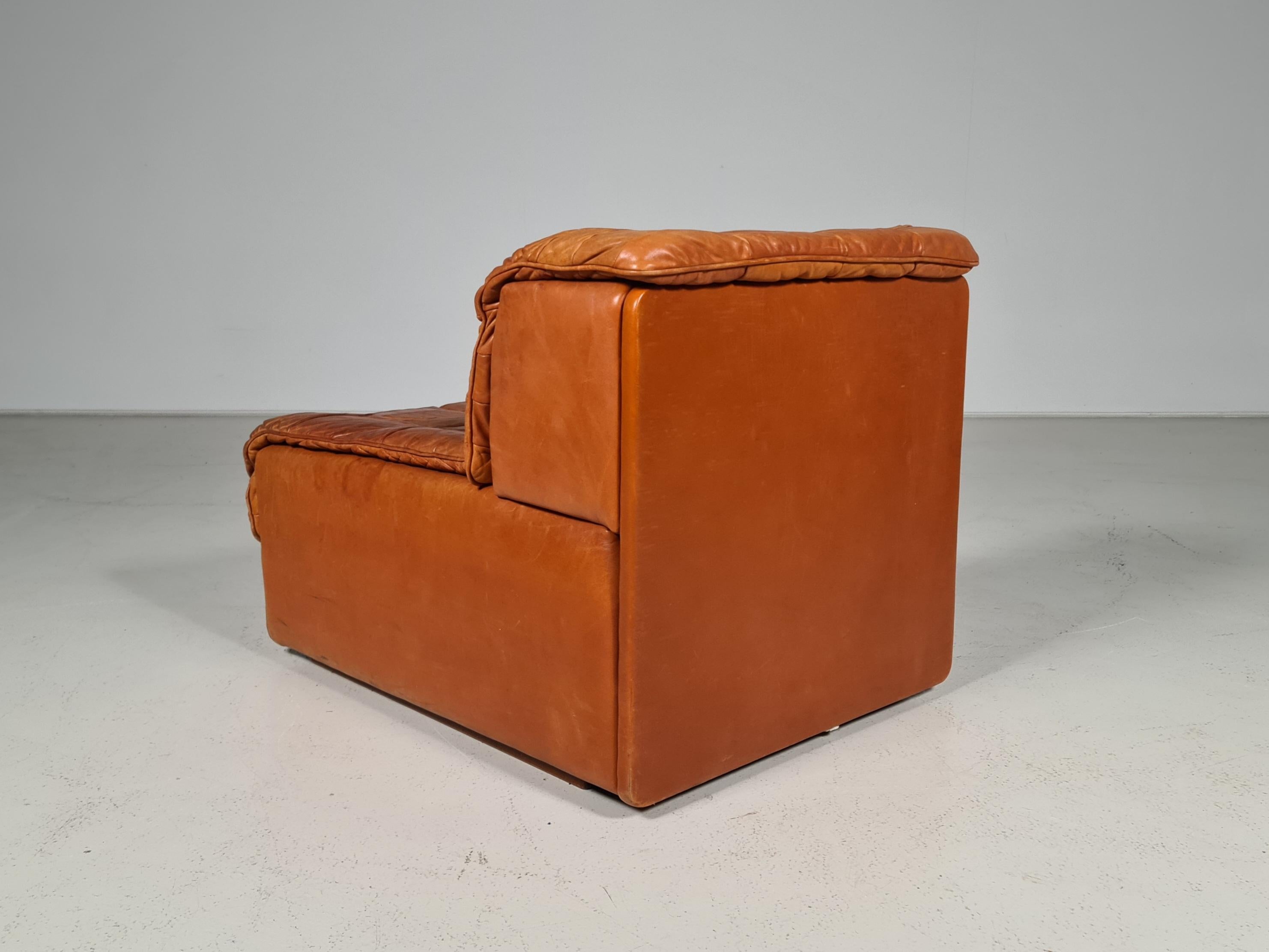 Cognac leather patchwork De Sede DS11 chair, Switzerland, 1970s.  Amazing patina.
 