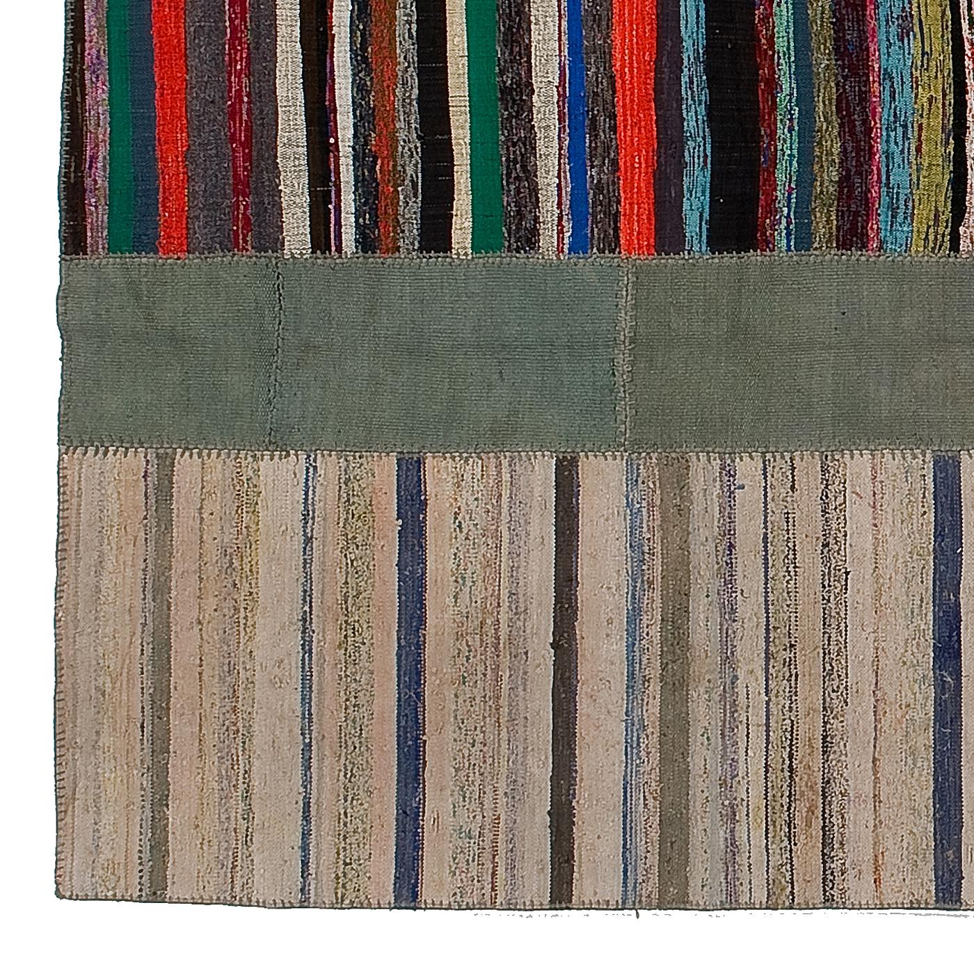 This mesmerizing carpet is part of the Patchwork collection, in which pieces of vintage rugs are cut by hand, dyed with vegetable substances, and hand sewn using precious yarns to create pieces of striking floor decorations that effortlessly combine