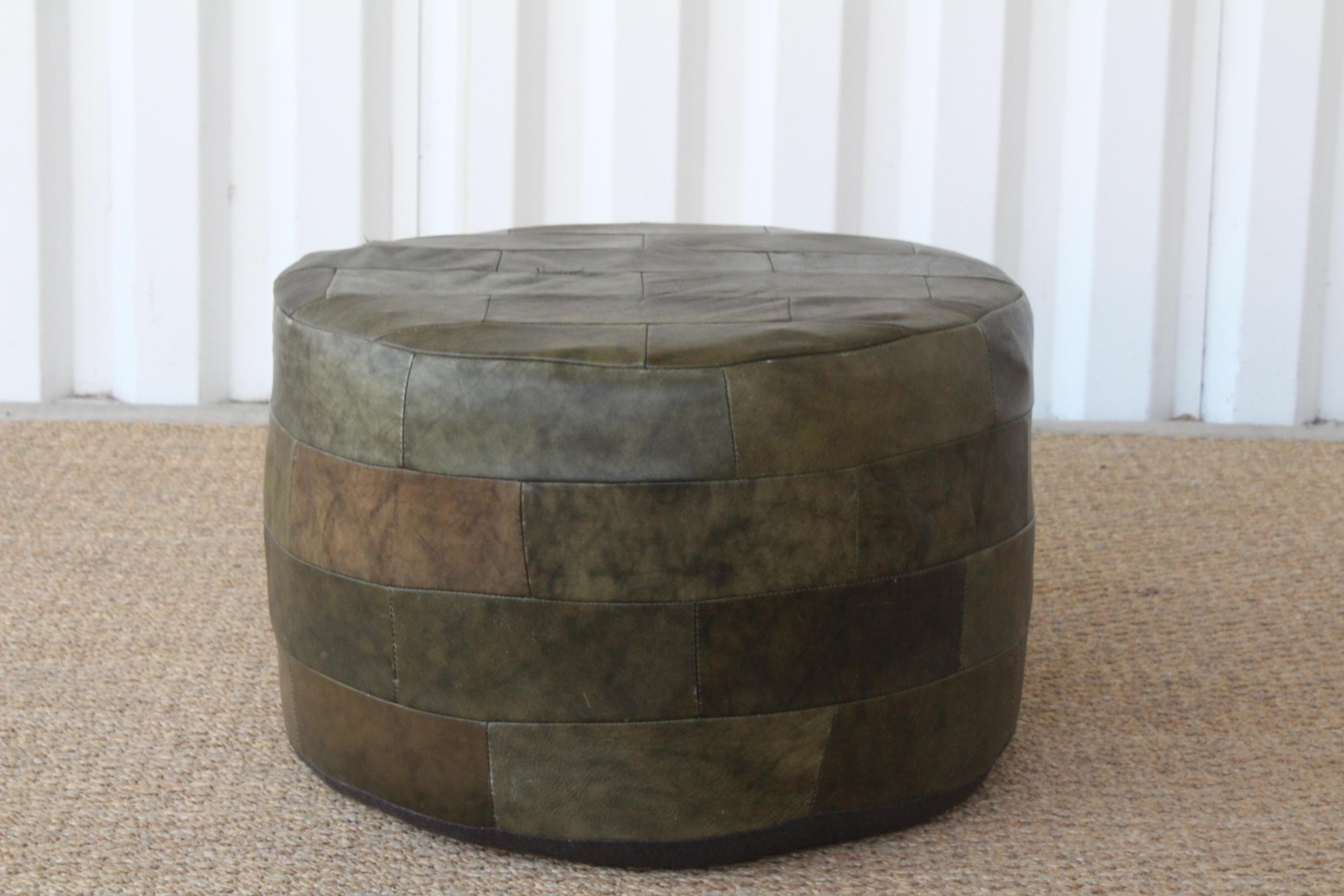 Vintage patchwork leather ottoman by De Sede, Switzerland, 1960s. New foam insert. In great condition with patina to the leather. This stool has one repaired stitched seam on the top of the seat.