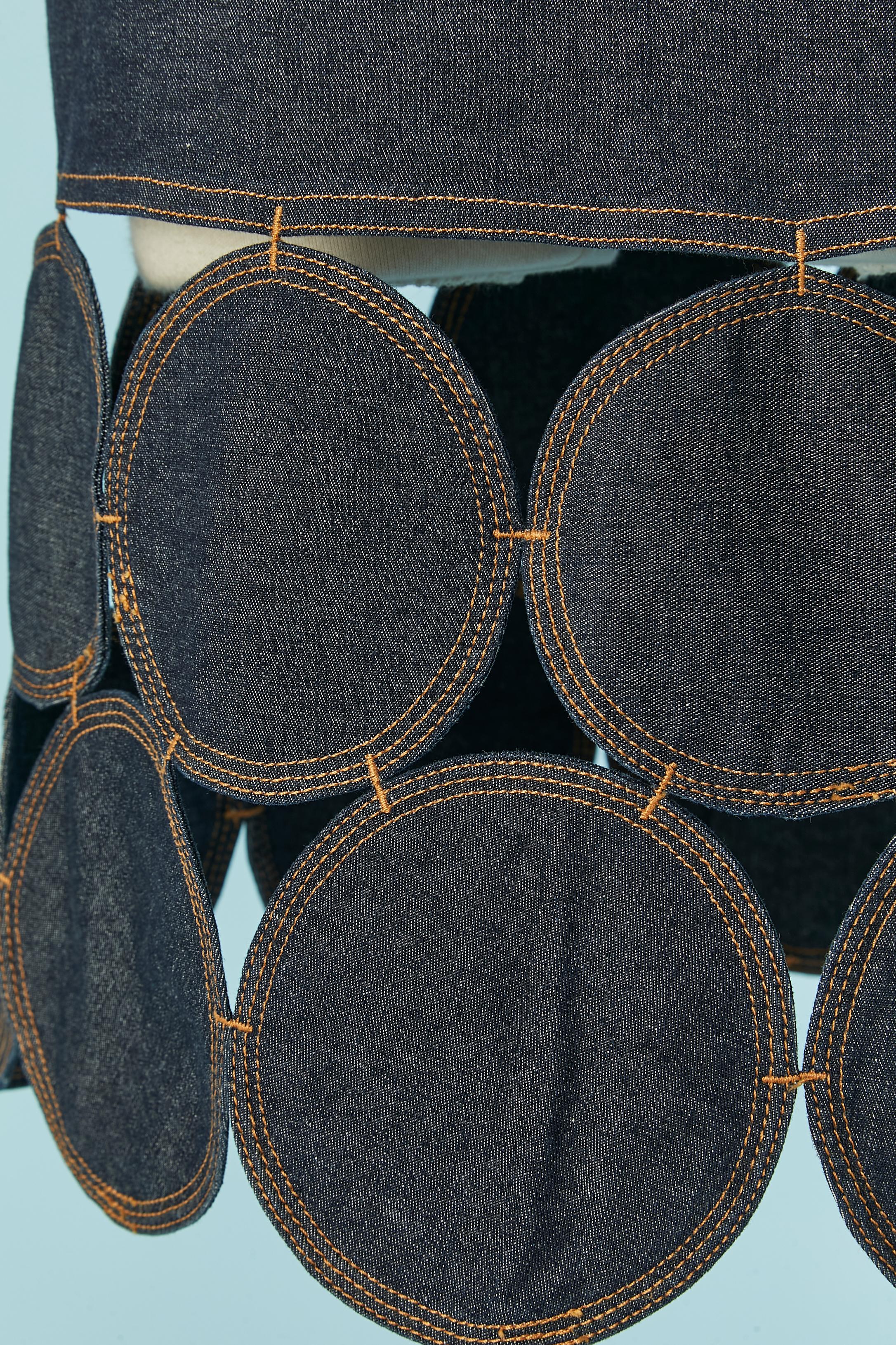 Patchwork skirt in blue denim . Fabric composition: 98% cotton, 2% elasthane
Zip closure on the left side. 
SIZE 40 (It) M 