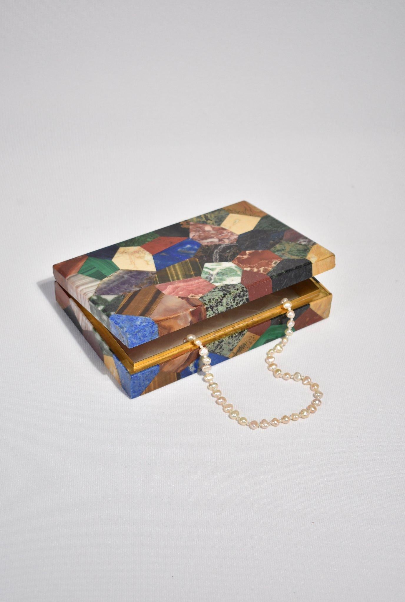 One-of-a-kind, semi-precious stone patchwork box by Asprey London.

 