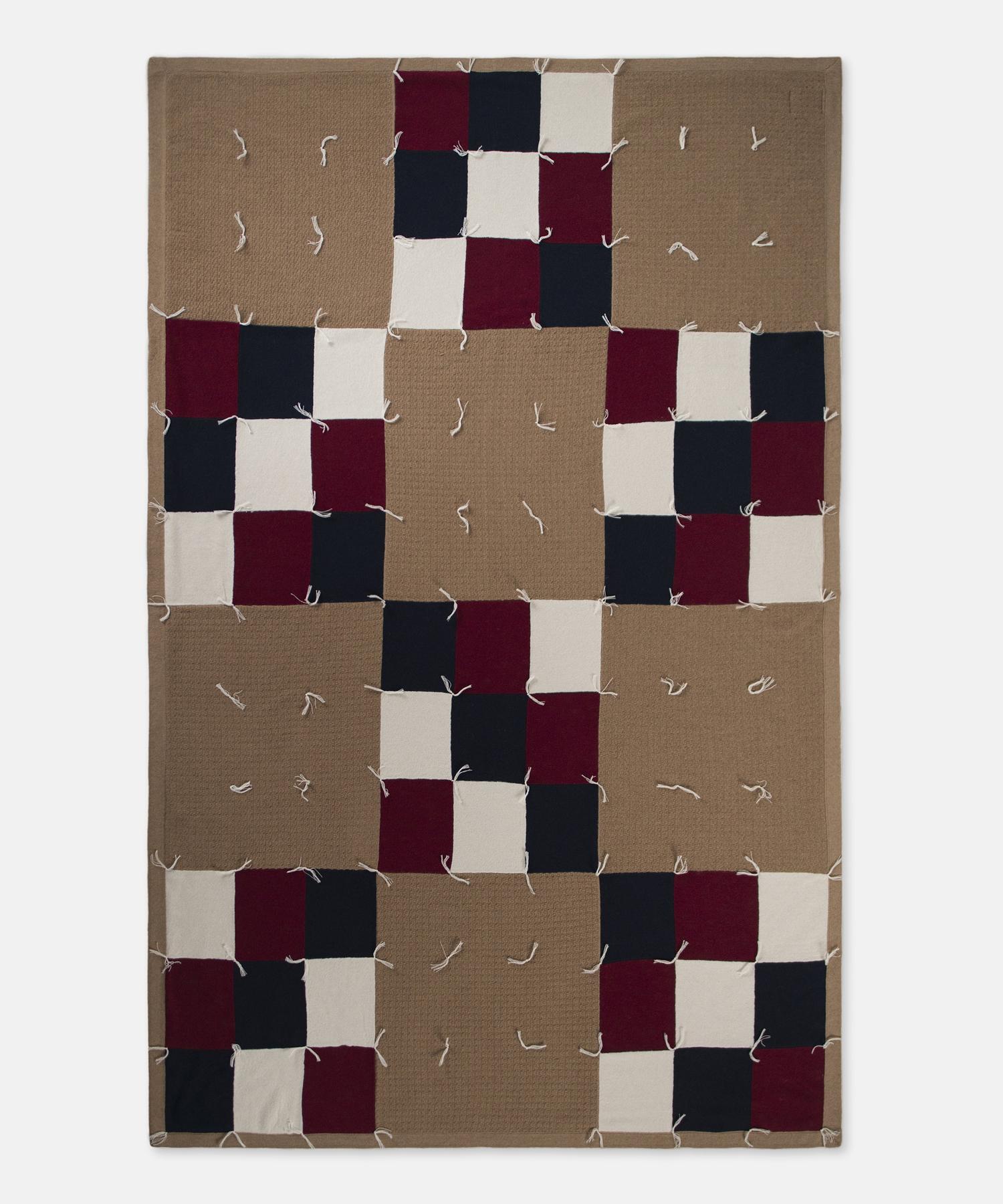 Patchwork tacked quilt by Saved, New York.

A modern take on the quilt with each square delicately sewn together by hand, backed and then tacked together with cashmere yarn. Available in King and Queen sizes, please inquire for pricing,