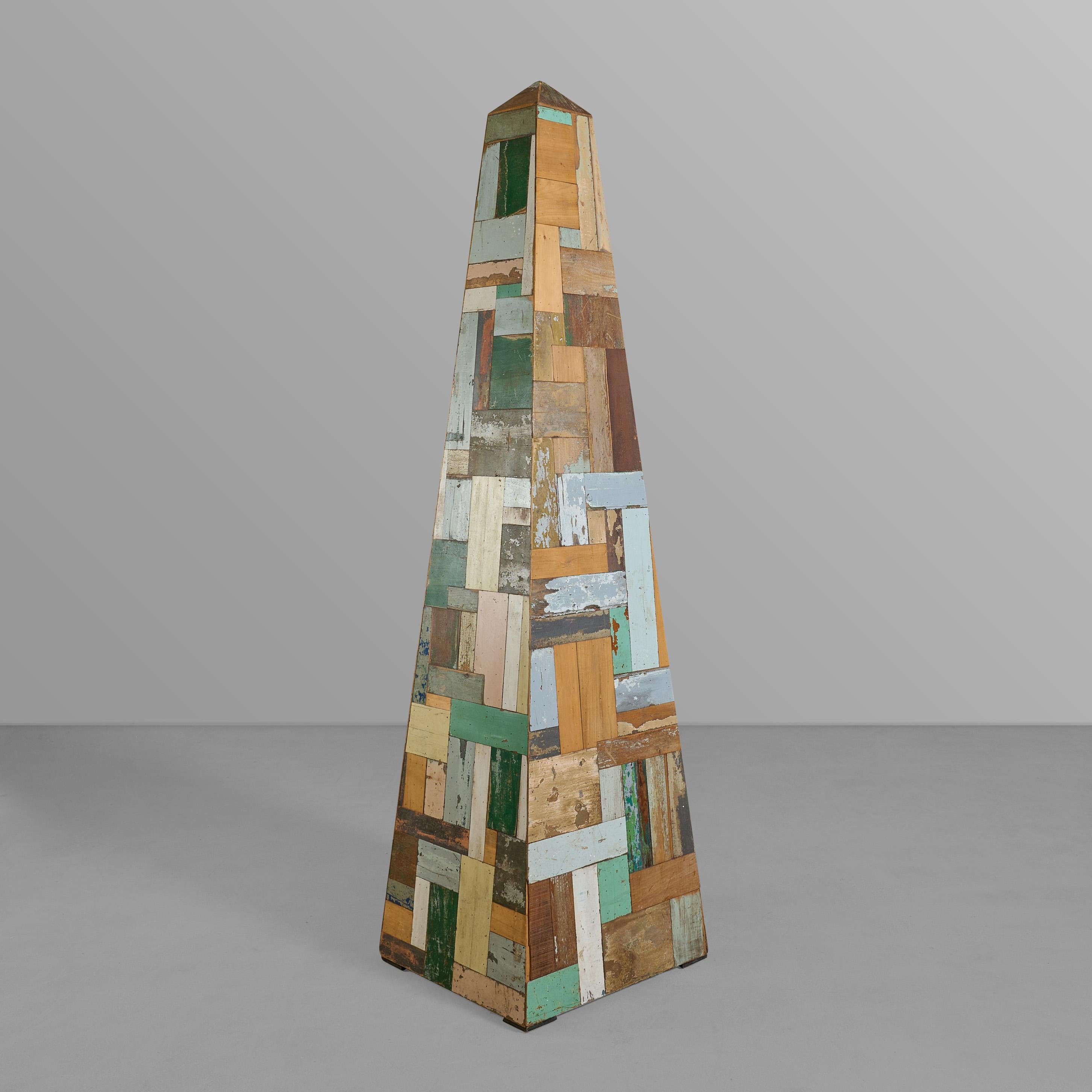 New construction patchwork wood obelisk from a maker in Argentina.


