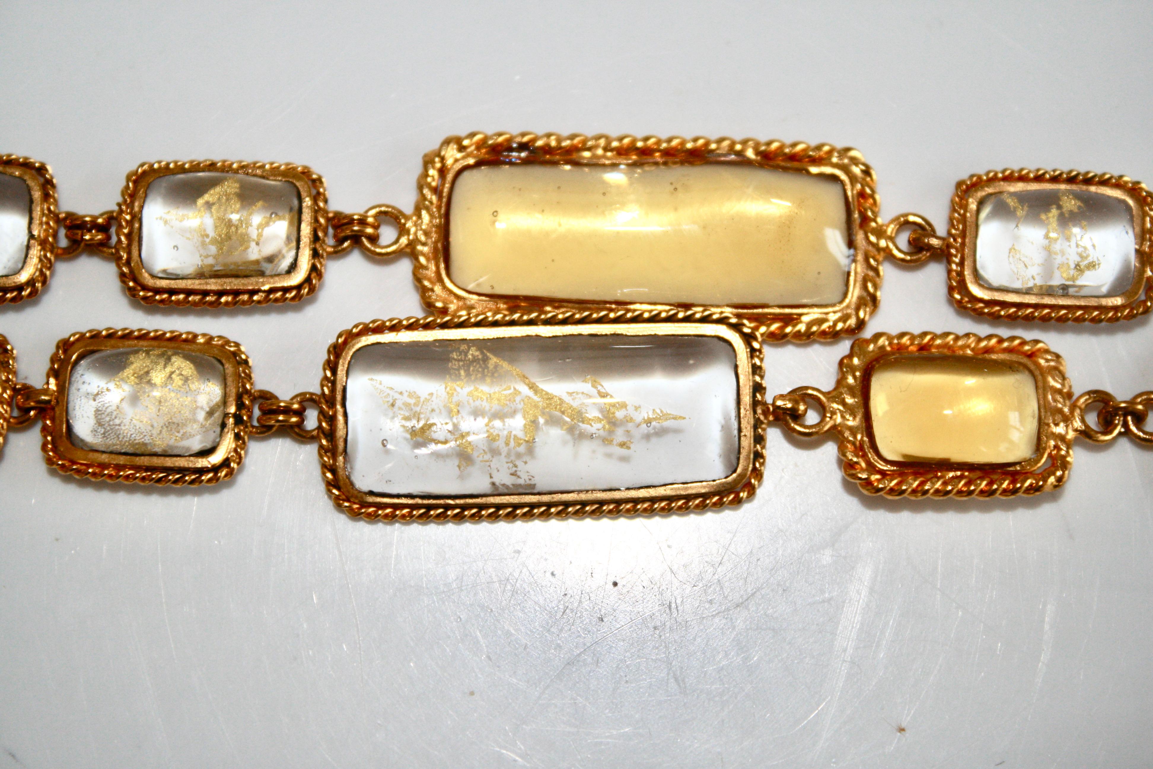 Poured glass or Pate de verre process bracelet in shades of pale gold and honey with gold leaf inlaid in clear glass.. made exclusively for Isabelle K.
Made by the former artisans of the atelier de Gripoix.
