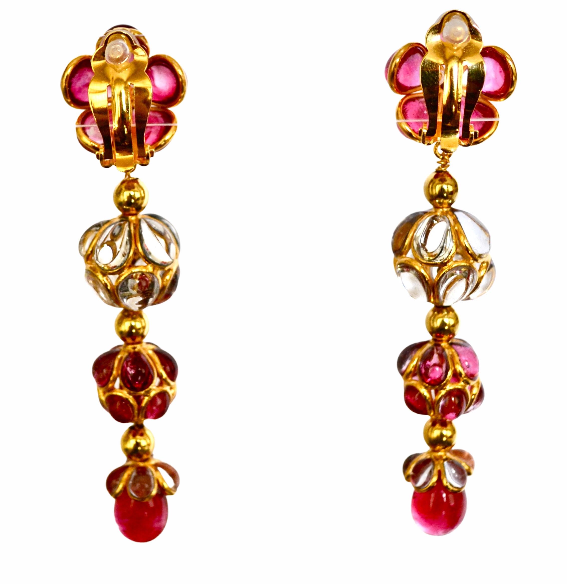Designed by the former artisans of the atelier of Gripoix, made in the special process of pate de verre or poured glass. 18-carat gilded brass, Swarovski crystal on clip.