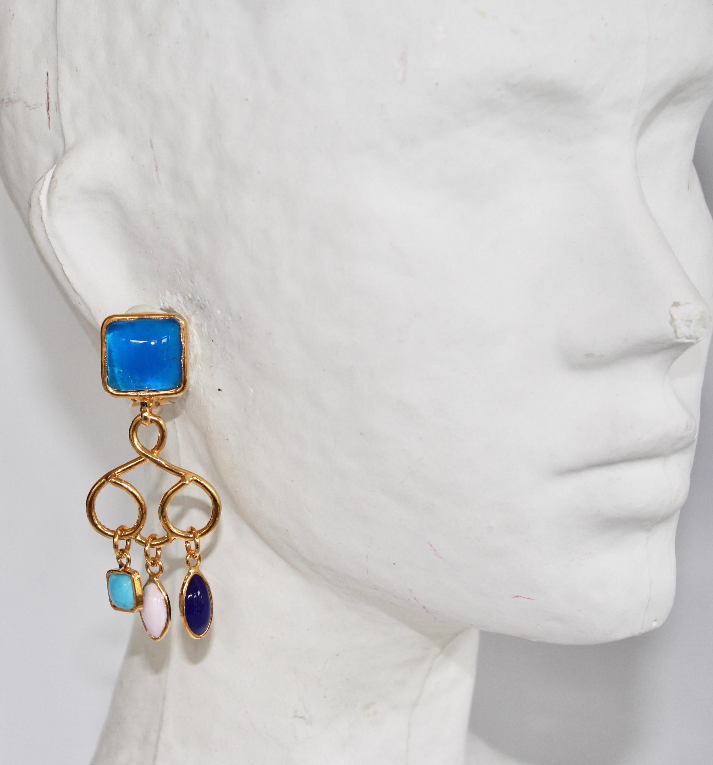 Hand molded glass clip earrings on gold made in Paris, France. 