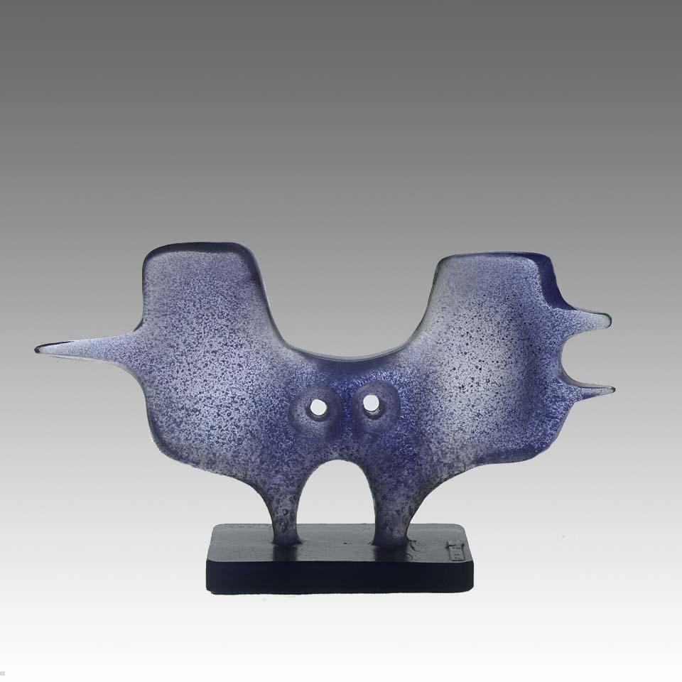 A fascinating limited edition pate de verre glass abstract study of the ferocious fire breathing Chimera with excellent lilac colour and very fine detail. Stamped Daum France, signed Roman and numbered 23/200.

Additional Information

Height: 16