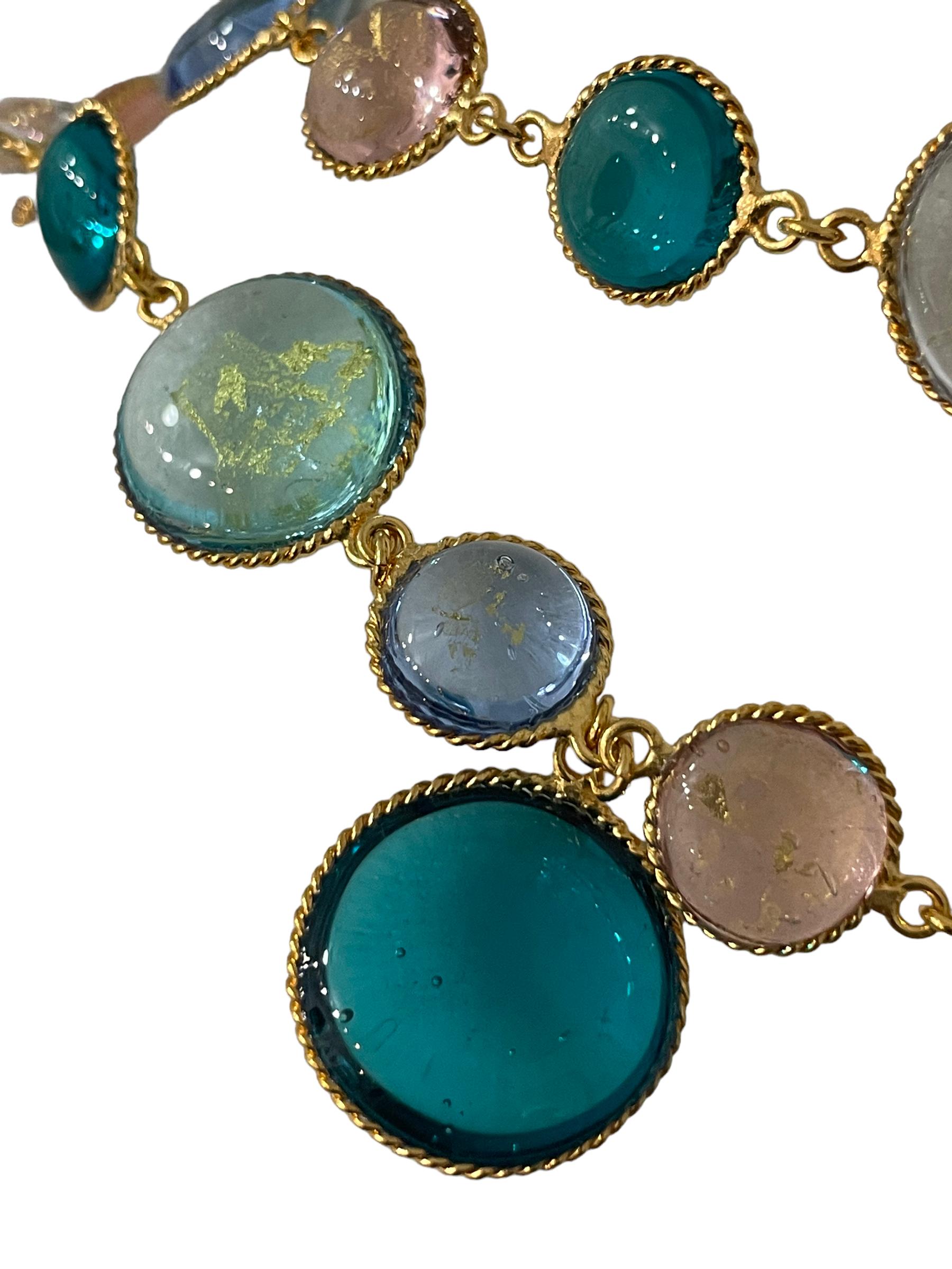 Masterfully crafted glass necklace in dreamy hues of blues and aqua and soft pink with gold leaves inserted from Pate de Verre Collection. 
Designed by a former artisan of the Atelier de GRIPOIX in the savoir faire used for all the Chanel pieces