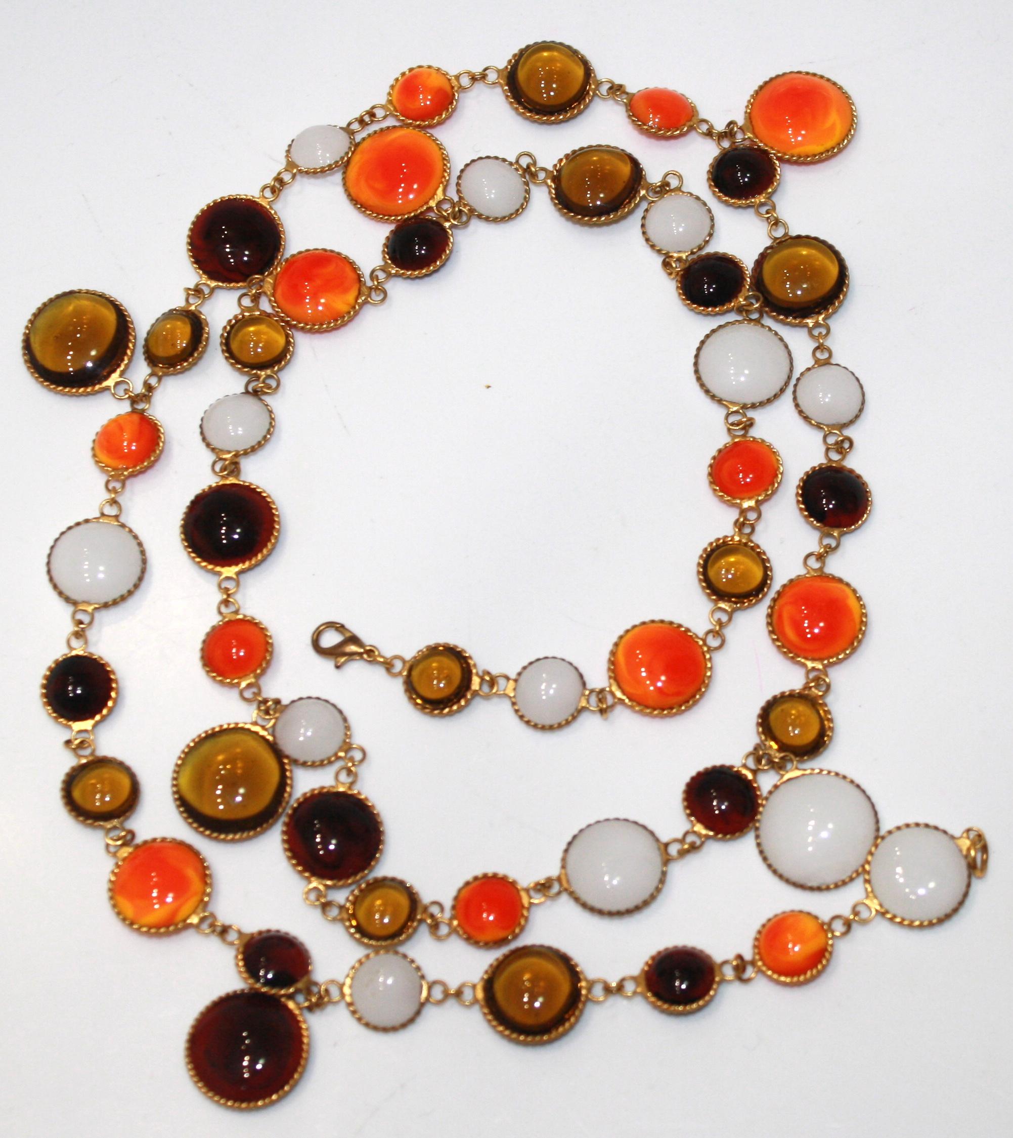Orange, alabaster, honey colored pate de verre handmade by former artisans of the house of Gripoix. Unique color combination for Isabelle k Jewelry