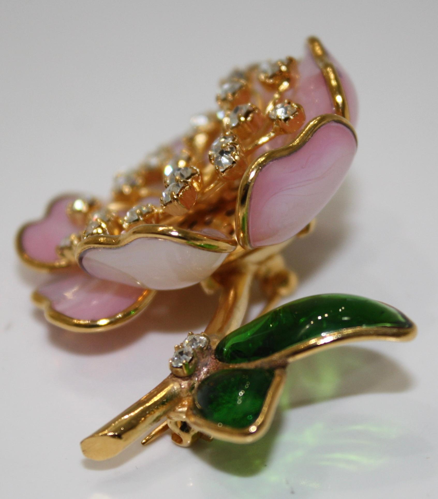 Made by the former artisans of the House of Gripoix in the poured glass art. Swarovski crystals stems. Gilded brass metals