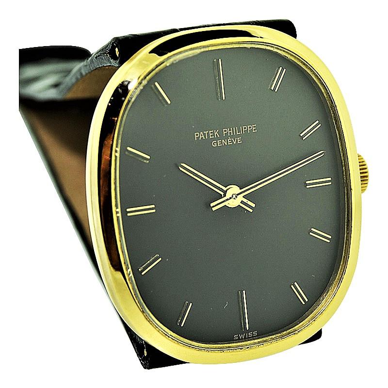 FACTORY / HOUSE: Patek Philippe & Cie
STYLE / REFERENCE: Golden Ellipse / Ref. 3548 
METAL / MATERIAL: 18kt Yellow Gold
CIRCA: 1969
DIMENSIONS: 32mm X 27mm
MOVEMENT / CALIBER: Manual Winding / 18 Jewels / 23-300 Caliber
DIAL / HANDS: Original Black