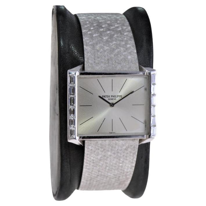 FACTORY / HOUSE: Patek Philippe Watch Company
STYLE / REFERENCE: Dress Style /  Reference 3506-2
METAL / MATERIAL: 18Kt Solid White Gold 
CIRCA / YEAR: 1960's
DIMENSIONS / SIZE: Length 30mm X Width 27mm
MOVEMENT / CALIBER: Manual Winding / 18 Jewels