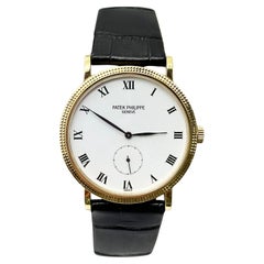 Patek 3919J Calatrava 18K Yellow Gold White Roman Dial Patek Archive Paper