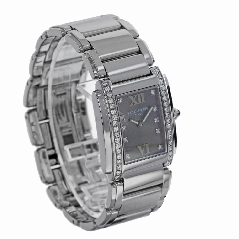 Patek Philippe Twenty 4 Reference #:4910. Women's  stainless steel, Patek Philippe, Twenty 4  4910, swiss quartz. Verified and Certified by WatchFacts. 1 year warranty offered by WatchFacts.
