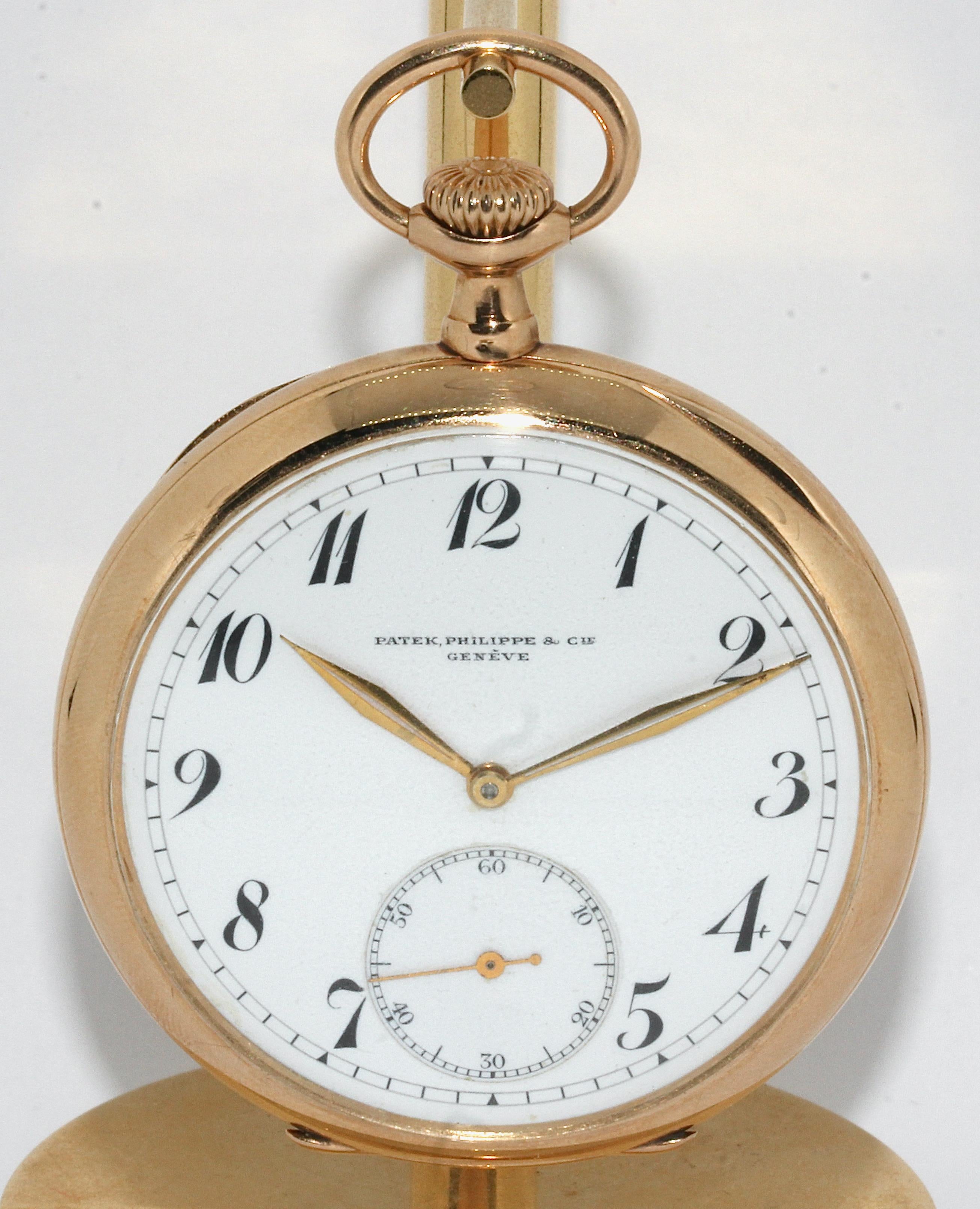 Patek Philippe Gold Pocket Watch, Arabic Enamel Dial

Slight signs of wear due to age on the case.
Hands possibly replaced.

Diameter measured without the crown.
The pocket watch can be wound, the movement works and the hands move.
