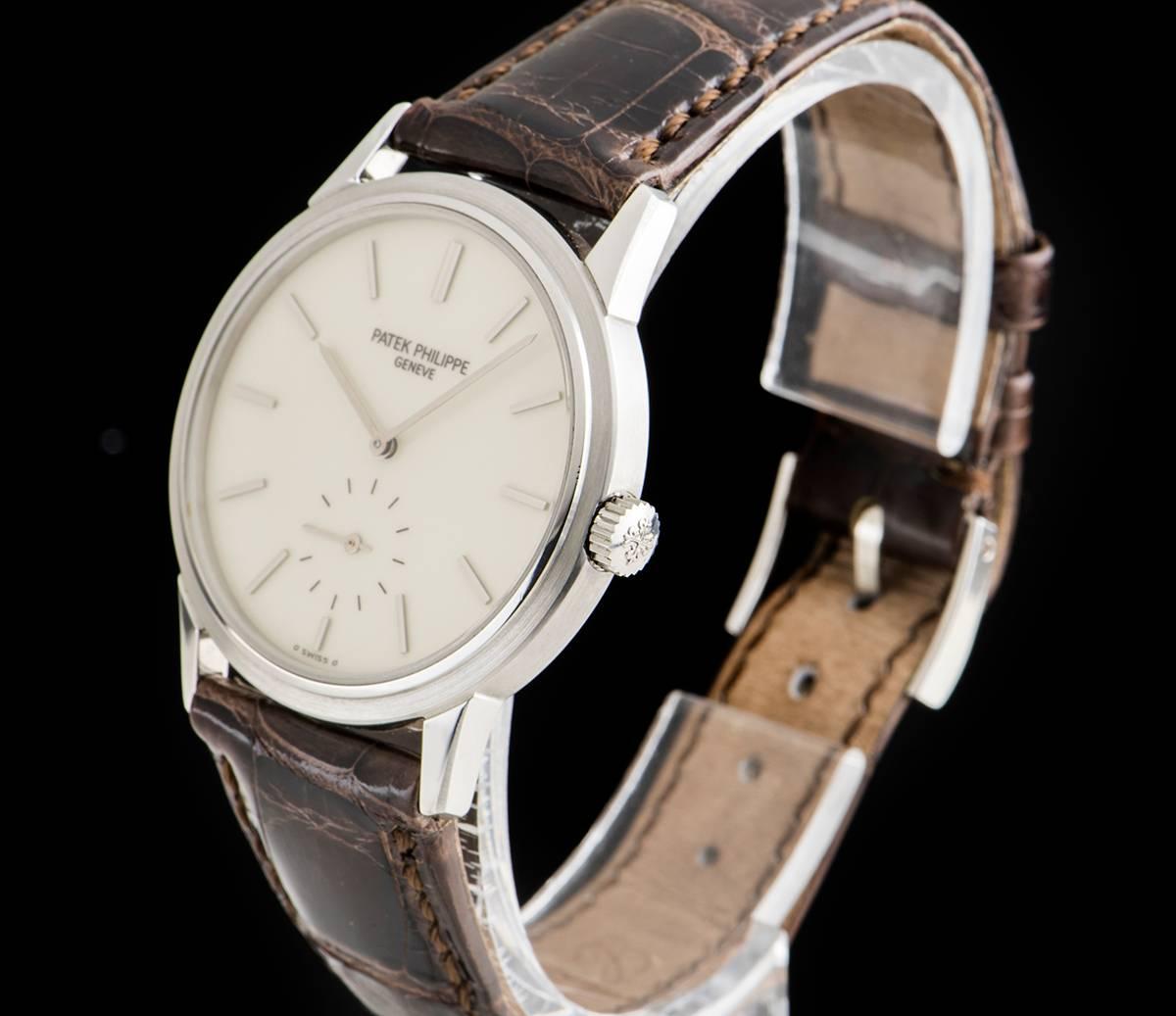 A Stainless Steel 150th Anniversary Calatrava Gents Wristwatch, very rare enamel dial with applied hour markers, small seconds at 6 0'clock, a fixed stainless steel bezel, an original brown leather strap with a stainless steel pin buckle (not by