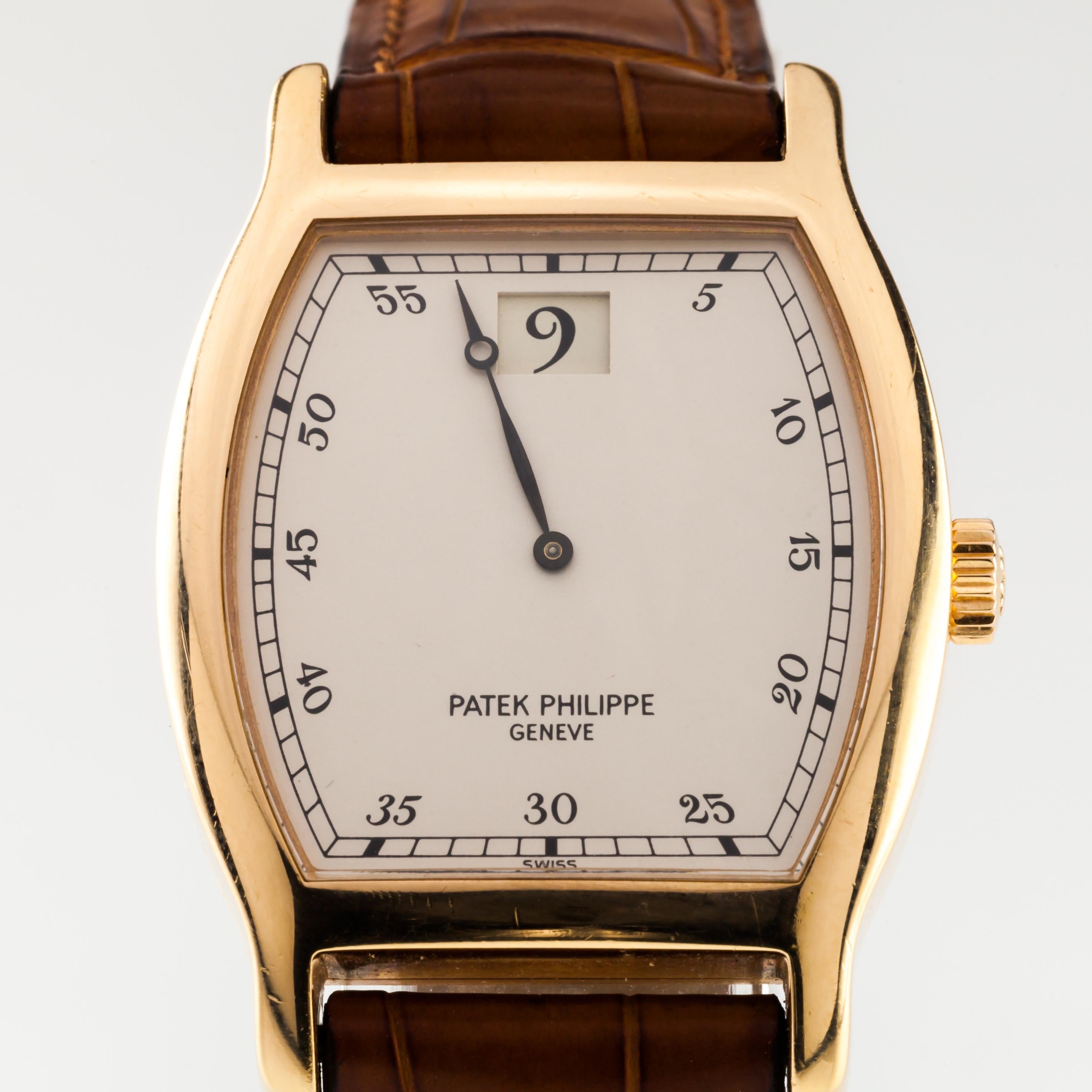 Model #3969R
Case #752913
Originally issued to commemorate Patek Philippe's 150th Anniversary, recreating its original Jumping Hour tonneau design. 450 were manufactured in 18k Rose Gold. Amazing Collectible Watch!

18k Rose Gold Tonneau Shaped
