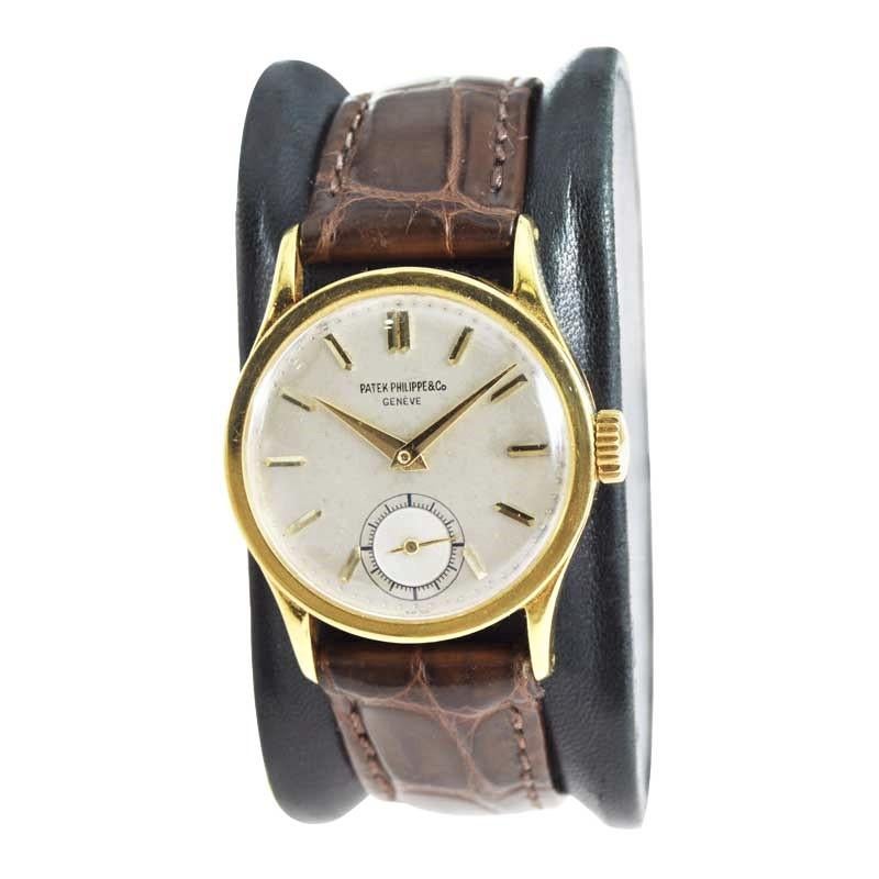 FACTORY / HOUSE: Patek Philippe et Cie.
STYLE / REFERENCE: Round Calatrava / Ref. 96
METAL / MATERIAL: 18 Karat Yellow Gold
CIRCA / YEAR: 1940's
DIMENSIONS / SIZE: 38 mm X 31 mm
MOVEMENT / CALIBER: Manual Winding / 18 Jewels
DIAL / HANDS: Original