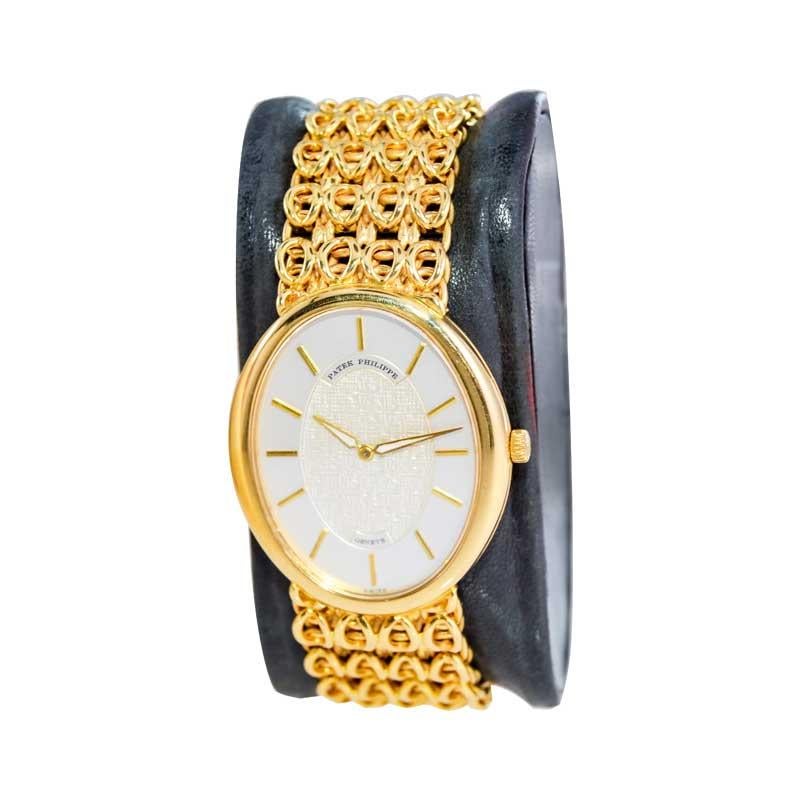 Women's or Men's Patek Philippe 18 Karat Gold Men's Bracelet Watch with Gold Dial, from 1973 For Sale