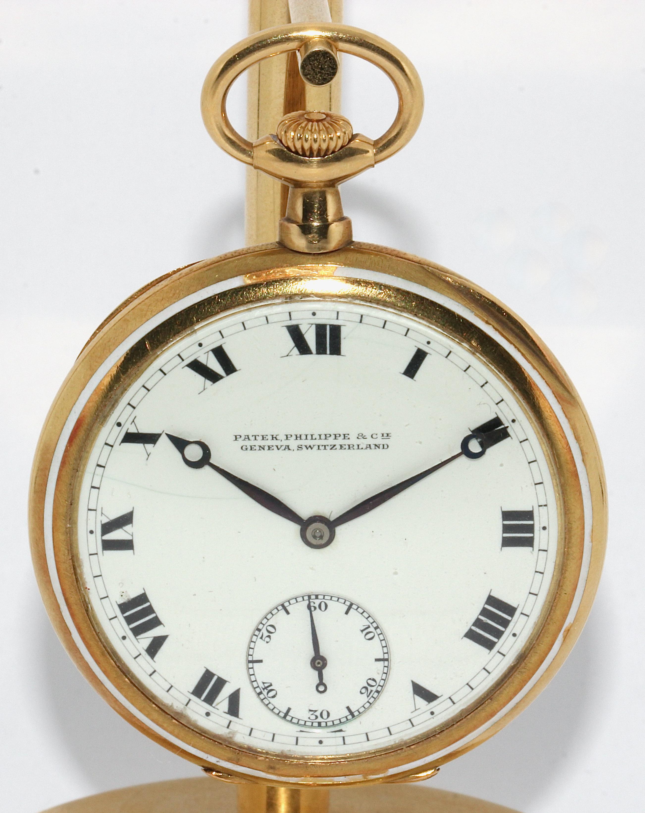 Patek Philippe 18 Karat Gold Pomp Pocket Watch.

Slight signs of wear due to age on the case.
Dial with hairline crack. Enamel decoration worn in places.

Diameter measured without the crown.
The pocket watch can be wound, the movement works and the