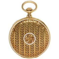 Taschenuhr aus 18 Karat Gold mit Pomp und Emaille von Patek Philippe
