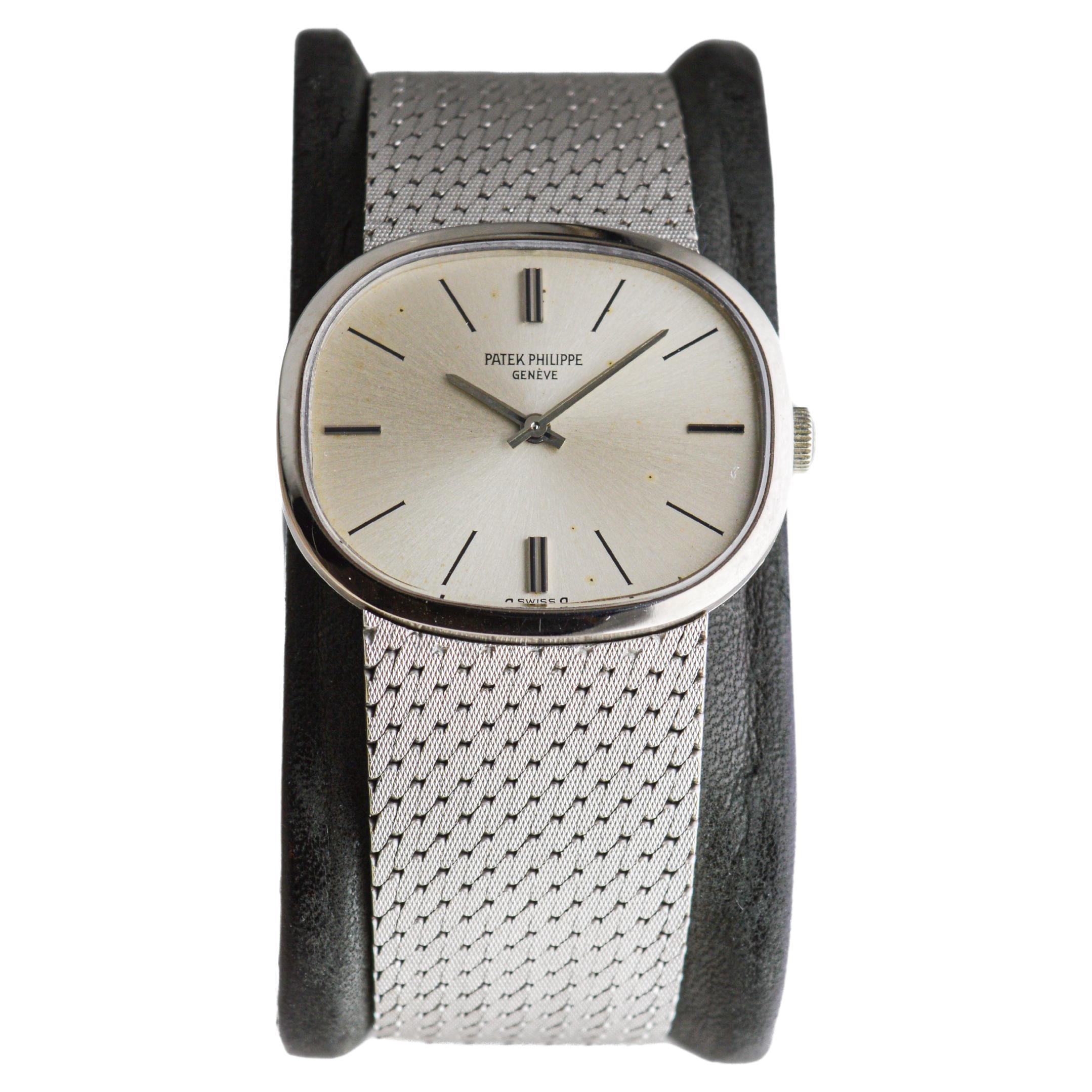 FACTORY / HOUSE: Patek Philippe & Cie.
STYLE / REFERENCE: Oval Dress Bracelet Watch / Reference 3545-1
METAL / MATERIAL: 18kt White Solid Gold
CIRCA / DATE: 1971 
DIMENSIONS: Length 32mm X Diameter 27mm
MOVEMENT / CALIBER: Manual Winding / 18 Jewels