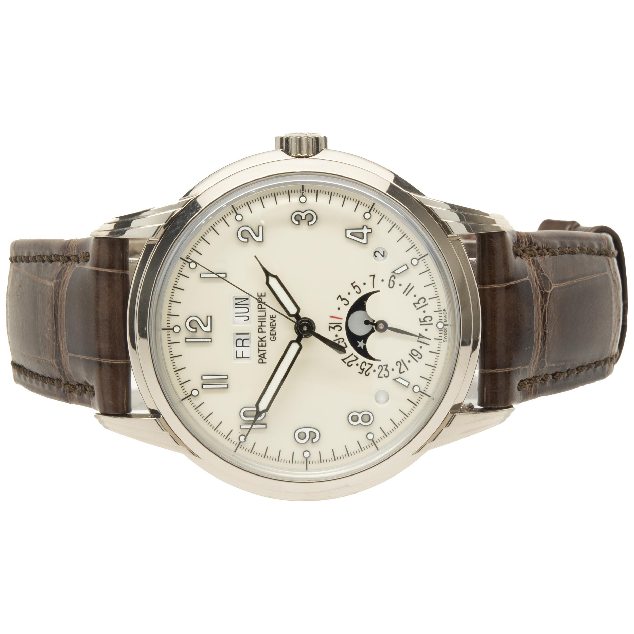 Movement: automatic
Function: hours, minutes, seconds, day, date, month, leap year, day/night indicator, moon phase
Case: 40mm 18K white gold round case, smooth bezel, sapphire crystal, push pull crown
Band: 18K white gold brown leather Patek