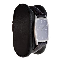 Patek Philippe 18 Karat White Gold Tonneau Shape Wristwatch with Carved Bezel