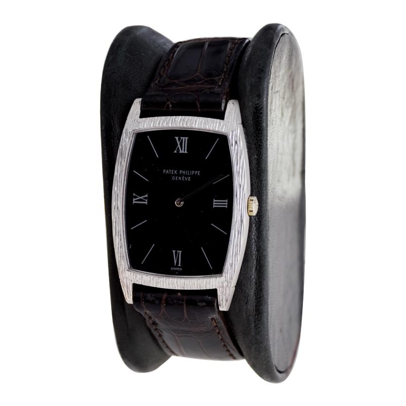 Women's or Men's Patek Philippe 18 Karat White Gold Tonneau Shape Wristwatch with Carved Bezel