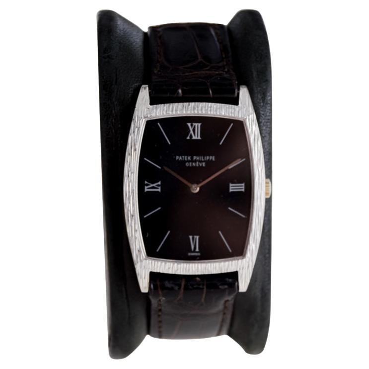 Patek Philippe 18 Karat White Gold Tonneau Shape Wristwatch with Carved Bezel
