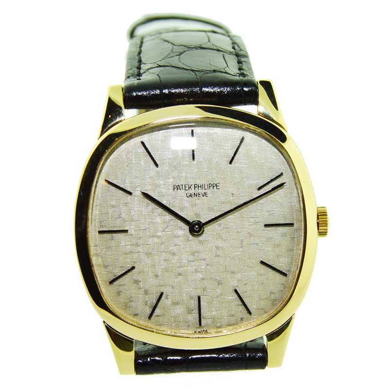 FACTORY / HOUSE: Patek Philippe & Cie.
STYLE / REFERENCE: Art Deco / Cushion Shape / Ref. 3544
METAL / MATERIAL: 18kt Yellow Gold
CIRCA: 1960's
DIMENSIONS: 39mm X 33mm
MOVEMENT / CALIBER: Manual Winding / 18 Jewels / Caliber 23-300 
DIAL / HANDS: