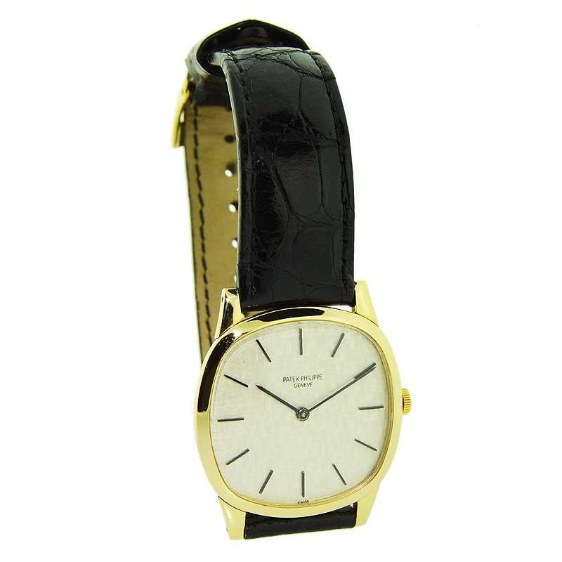 Patek Philippe 18 Karat Yellow Gold Cushion Shaped Watch, circa 1960s In Excellent Condition In Long Beach, CA