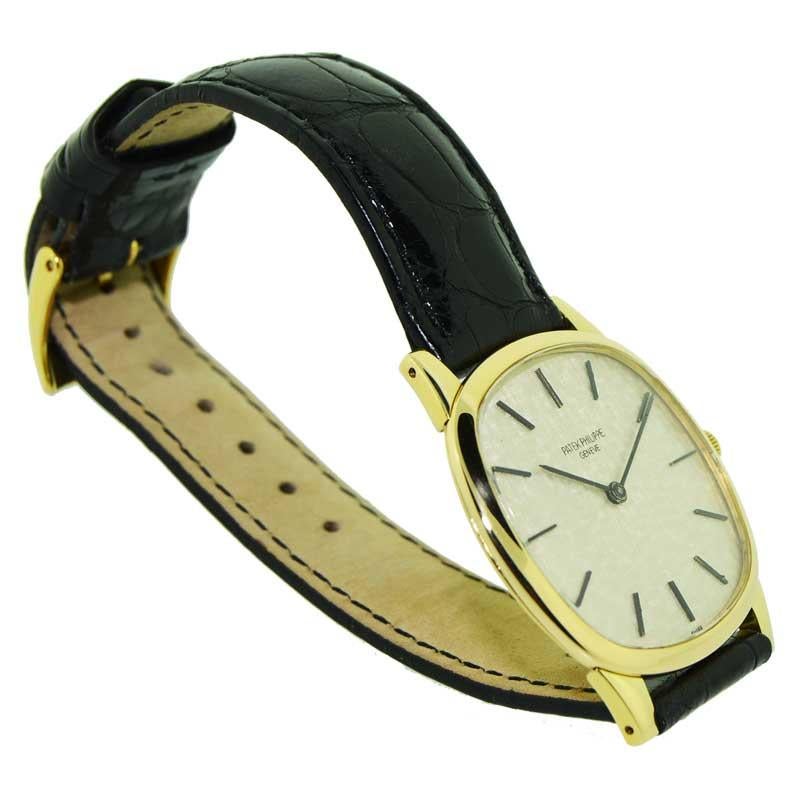 Patek Philippe 18 Karat Yellow Gold Cushion Shaped Watch, circa 1960s 2