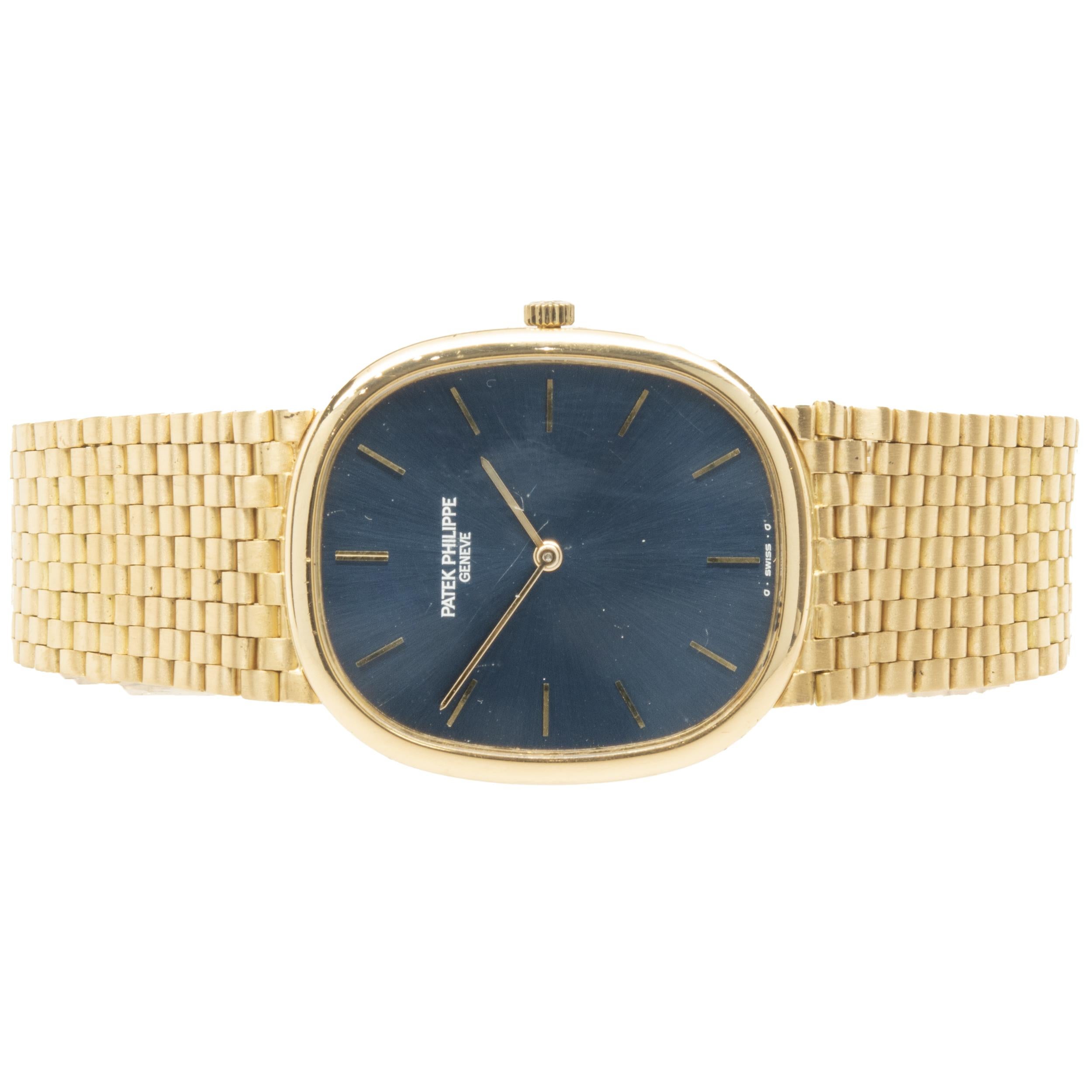 Movement: automatic
Function: hours, minutes, seconds 
Case: 36x 31mm 18K yellow gold ellipse case, smooth bezel, sapphire crystal, push pull crown
Band: 18K yellow gold Patek Philippe mesh bracelet
Dial: blue stick 
Reference: 3838/1

Complete with