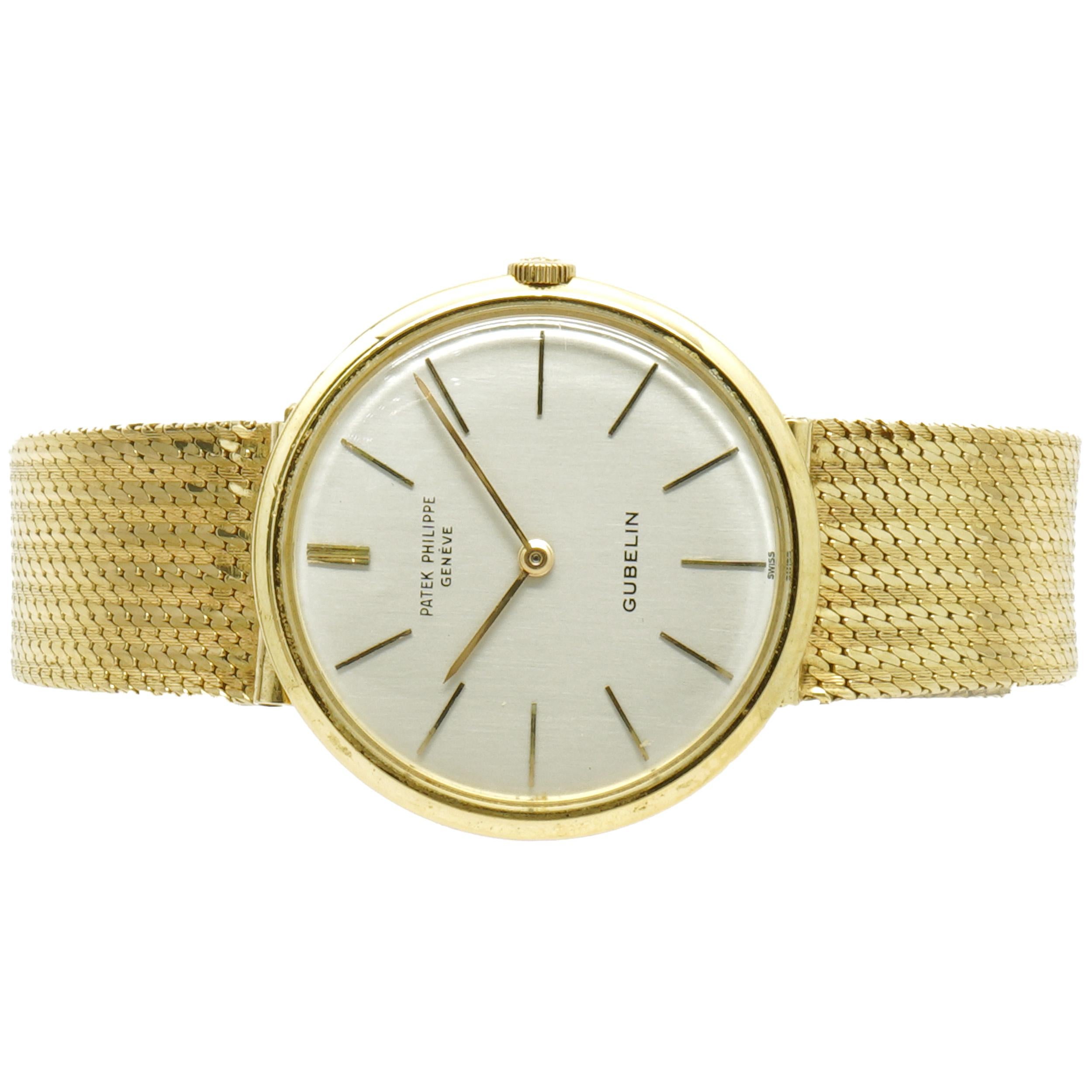 Movement: manual wind
Function: hours, minutes
Case: 35mm 18K yellow gold round case, 18K yellow smooth bezel, acrylic crystal, push pull crown
Band: 18K yellow gold mesh bracelet, integrated clasp
Dial: silver stick
Reference: 2591
Serial: