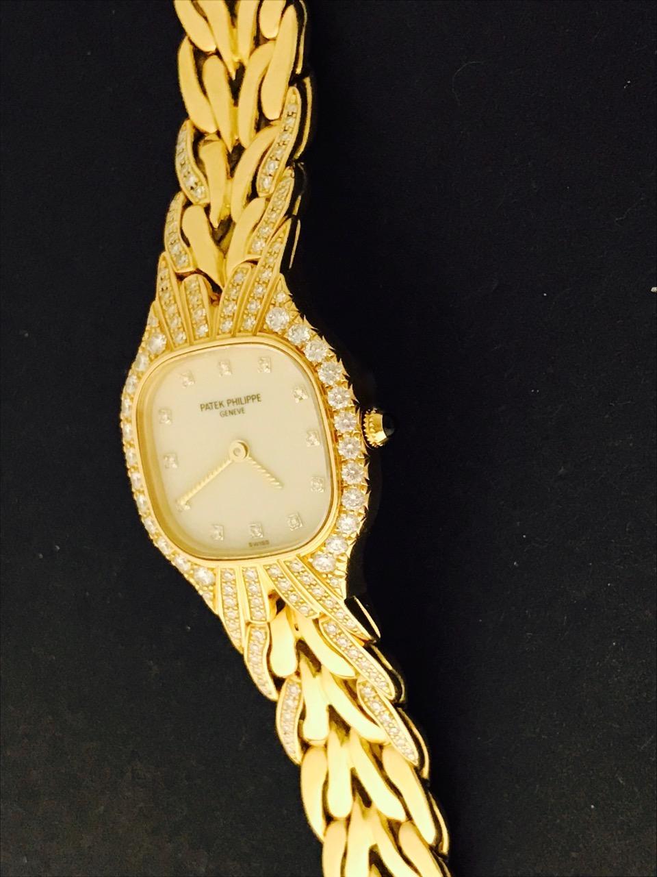 Women's Patek Philippe 18 Karat Yellow Gold La Flamme Diamond Quartz Wristwatch