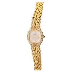 Patek Philippe 18 Karat Yellow Gold La Flamme Diamond Quartz Wristwatch