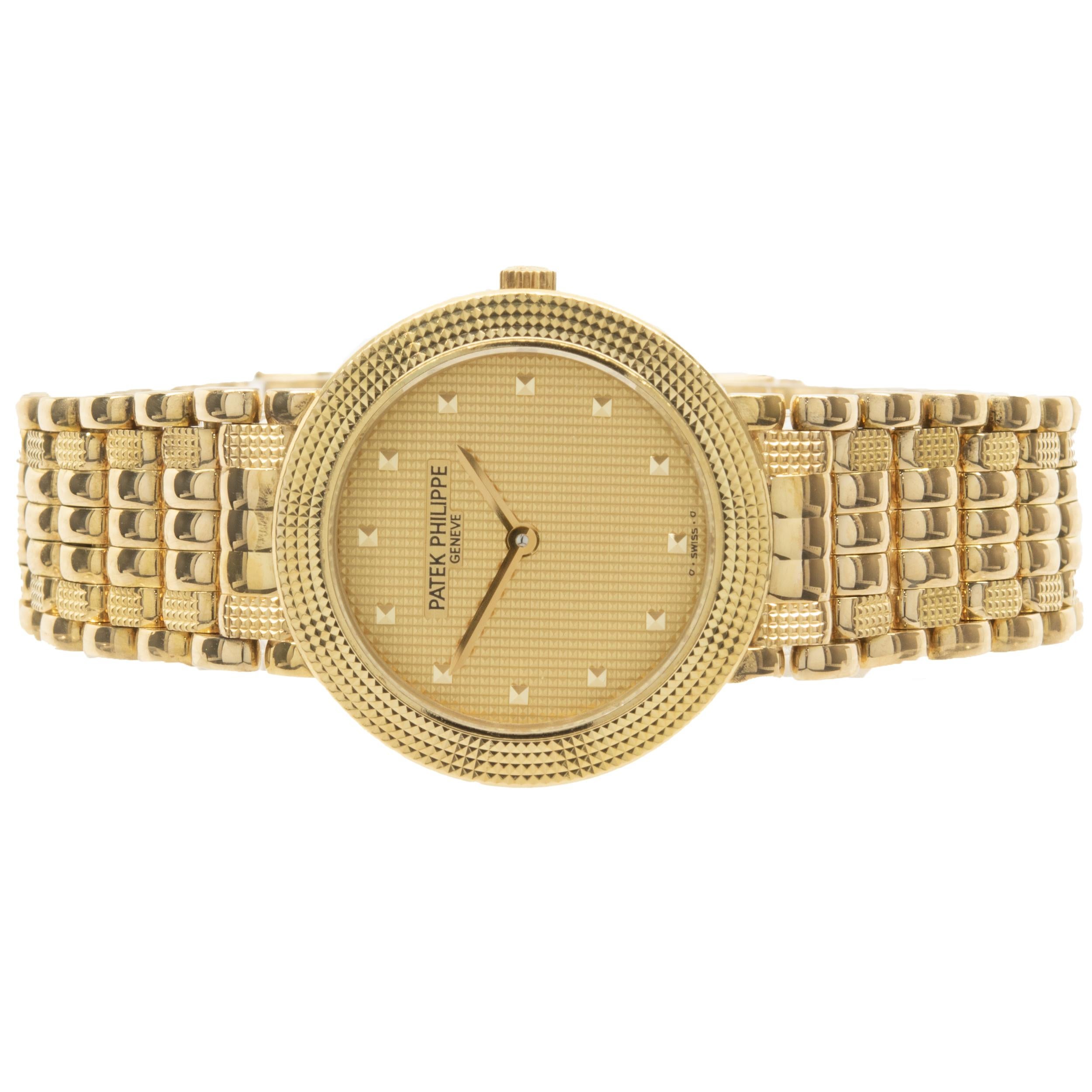 Movement: quartz
Function: hours, minutes
Case: 25mm 18K yellow gold case, hobnail bezel, sapphire crystal, push pull crown
Band: 18K yellow gold hobnail link bracelet,  fold over clasp
Dial: champagne hobnail dial
Reference: 4919/8
Serial: