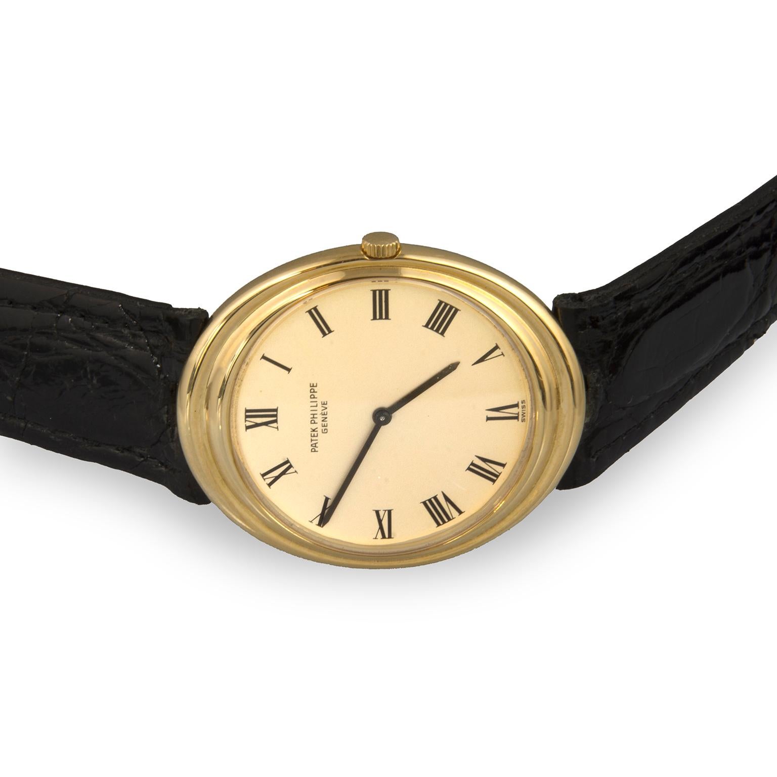 Patek Philippe 18 karat yellow gold wristwatch with original leather strap. Original certificate included