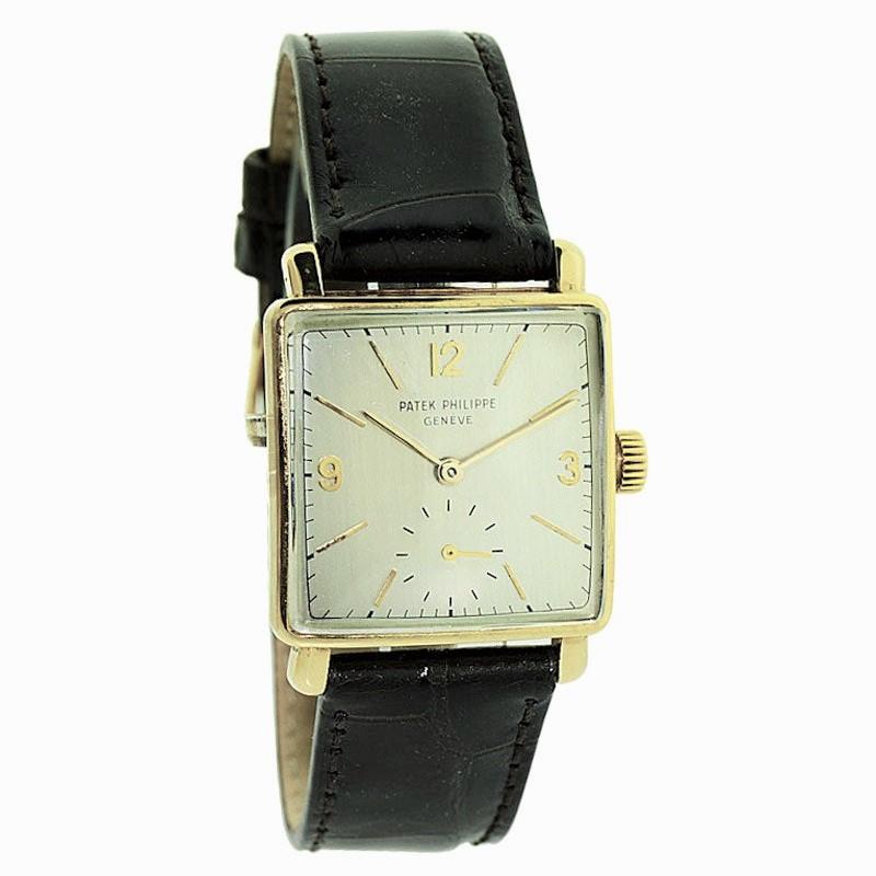 FACTORY / HOUSE: Patek Philippe et Cie.
STYLE / REFERENCE: Art Deco Tank / Ref. 1574
METAL / MATERIAL: 18kt Yellow Gold
DIMENSIONS: Length 34mm X Diameter 26mm
CIRCA YEAR: 1950
MOVEMENT / CALIBER: Manual Winding / 18 Jewels 
DIAL / HANDS: Silvered