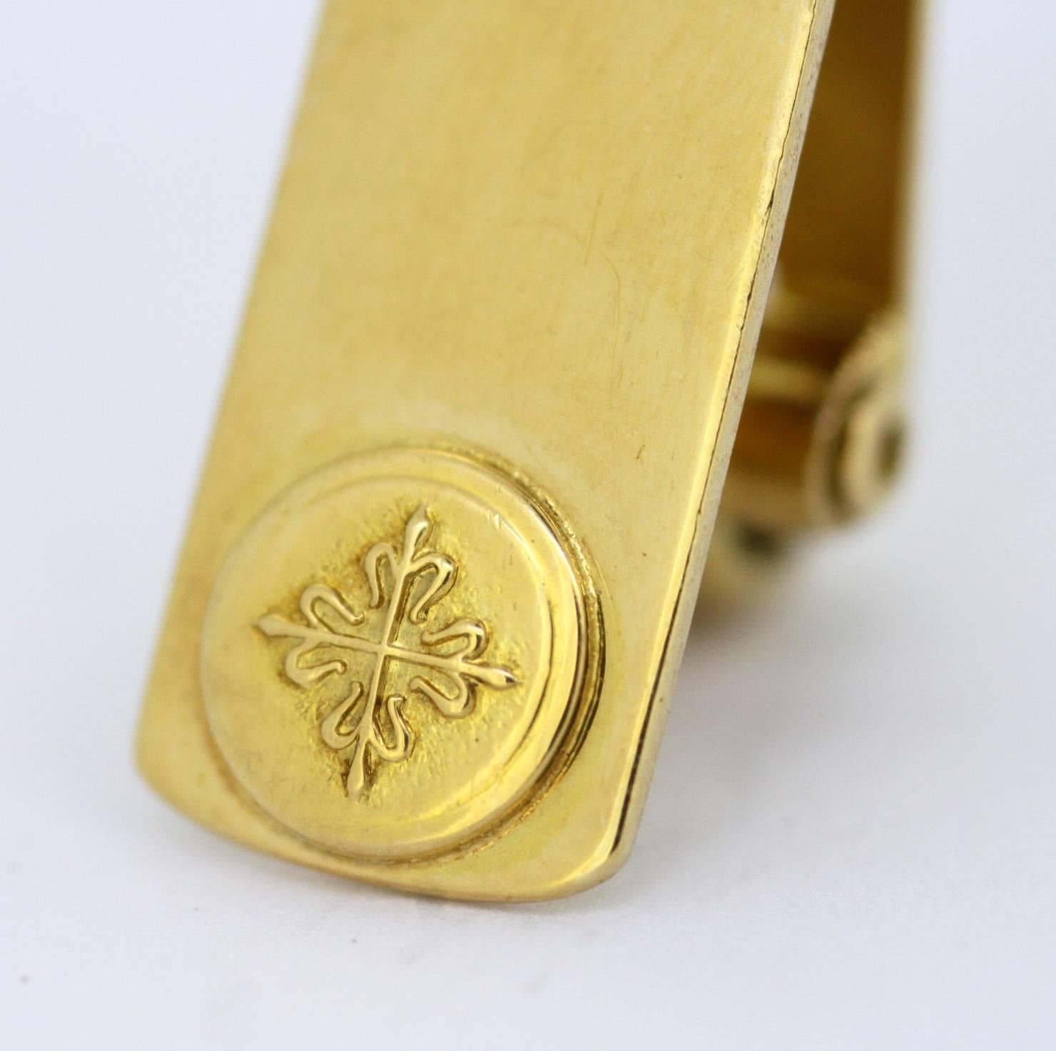 Patek Philippe 18K Gold Money / Tie Clip.
London 1963 
Fully hallmarked 

Dimensions - 
Size 3.2 x 0.8 x 1 cm 
Weight: 6 grams total 

Condition : Pre owned, has some minor surface wear from general usage, otherwise great condition with no damage,