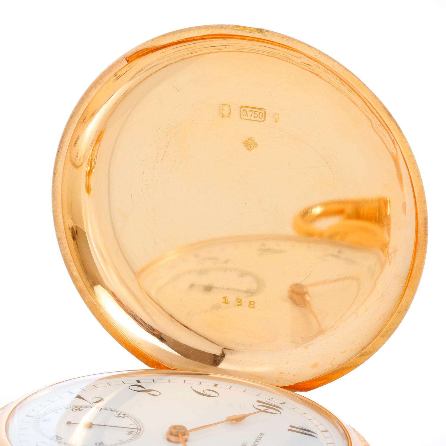 Patek Philippe 18K  Hunting Case Pocket Watch - Manual winding. 18K Yellow Gold case (51mm) . White dial with black Arabic numerals sub seconds at 6 o'clock position; Gold hands. Case & dial are signed. Pre-owned with Patek Philippe box.