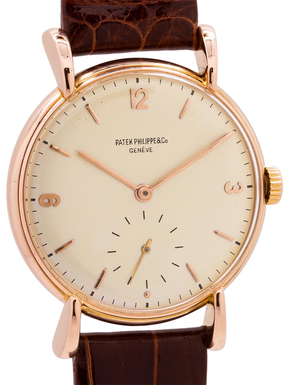 
Great looking vintage man’s Patek Philippe 18K PG ref# 1543 circa 1940’s. Featuring a very pleasing robust design 35mm diameter case with nicely splayed, extended, and downturned lugs. Featuring an exceptional condition original cream colored dial
