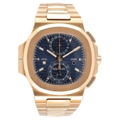 PATEK PHILIPPE Montre à cadran à plateau bleu en or rose 18 carats