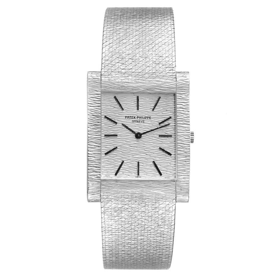 Patek Philippe 18k White Gold Textured Dial Vintage Mens Watch 3553 Box Papers. Manual winding movement. 18k white gold case 33.5 mm x 26.0 mm. . Scratch resistant sapphire crystal. Silver textured dial with applied baton hour markers. 18K white