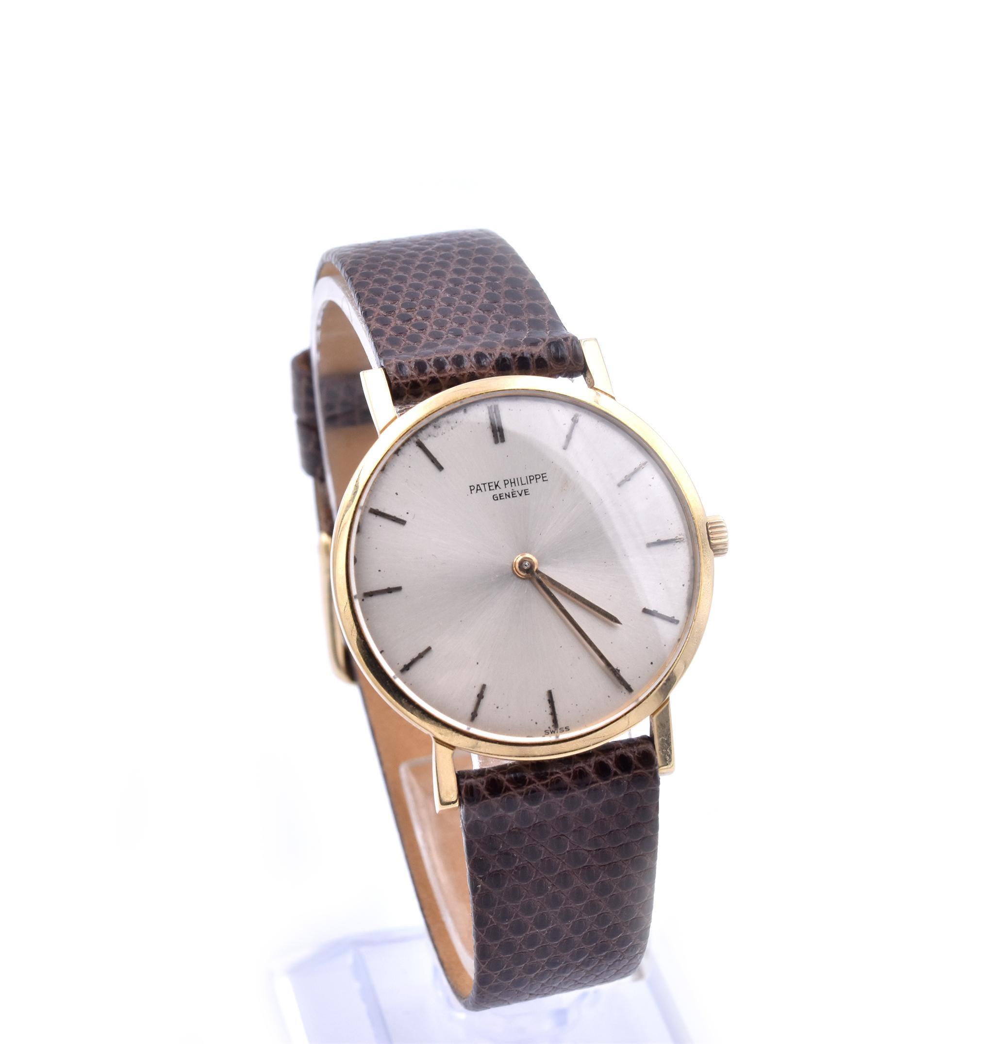Movement: Mechanical
Function: hours, minutes, date
Case: 34mm 18k yellow gold, sapphire protective crystal, push/pull crown
Dial: Silver stick dial, gold hands, 
Band: 16R generic genuine lizard dark brown strap 
Serial #: 315XXX
Reference #: 3512
