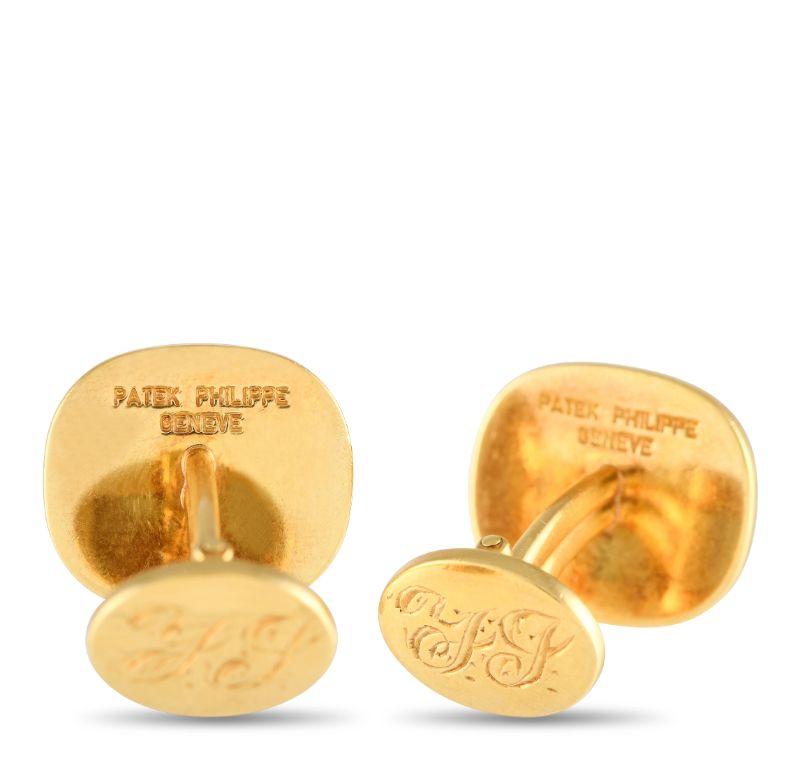 Subtly elevate any suited look by adding these impeccable Patek Philippe cufflinks. Made from solid 18K Yellow Gold, each one measures 0.65” long, 0.60” wide, and includes a stylized decoration at the center. 
 
 This jewelry piece is offered in